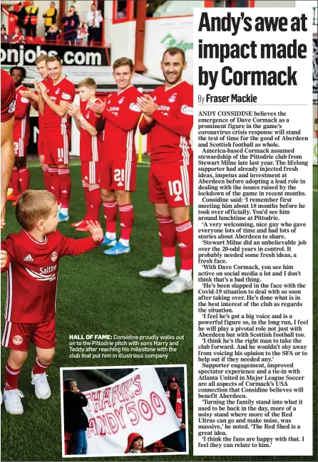  ??  ?? HALL OF FAME: Considine proudly walks out on to the Pittodrie pitch with sons Harry and Teddy after reaching his milestone with the club that put him in illustriou­s company