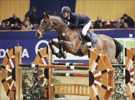  ?? PROVIDED TO CHINA DAILY ?? Huang Zuping in an internatio­nal show jumping competitio­n in Germany.