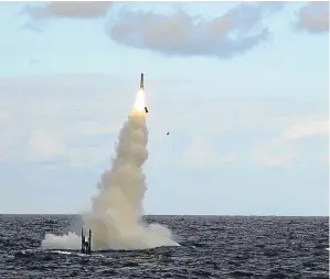  ??  ?? A Tomahawk missile launched from an American submarine.