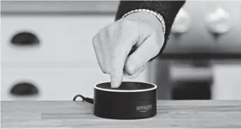  ?? JEFF CHIU, AP ?? On the Amazon Dot, Alexa can tell you a joke, set a timer, play your music and a whole lot more.