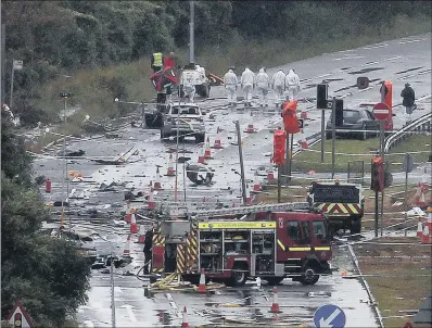  ?? PICTURE: PA WIRE ?? DEVASTATIO­N: The scene of the accident at Shoreham, in which Andrew Hill’s plane crashed on to the A27.