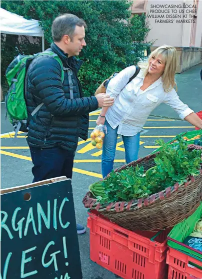  ??  ?? SHOWCASING LOCAL PRODUCE TO US CHEF WILLIAM DISSEN AT THE FARMERS’ MARKETS.