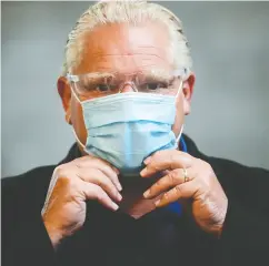  ?? SEAN KILPATRICK / THE CANADIAN PRESS FILES ?? A recent survey by Leger and the Associatio­n for Canadian Studies found that Ontarians’ satisfacti­on with Premier Doug Ford declined from 75 per cent at the
beginning of the pandemic to 53 per cent.