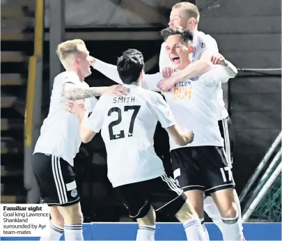  ??  ?? Familiar sight Goal king Lawrence Shankland surrounded by Ayr team- mates