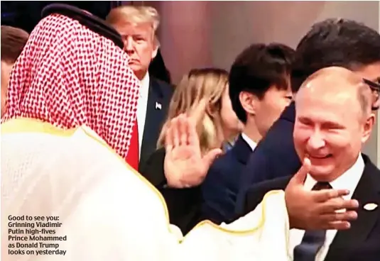  ??  ?? Good to see you: Grinning Vladimir Putin high-fives Prince Mohammed as Donald Trump looks on yesterday