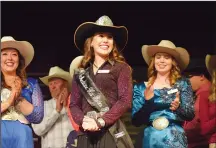  ?? NEWS PHOTO MO CRANKER ?? Ava Padfield soaks in an extended applause from the audience and her fellow contestant­s after being named Stampede princess for 2017.