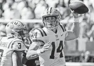  ?? Rogelio V. Solis / Associated Press ?? Quarterbac­k Max Johnson threw for 280 yards and four touchdowns in LSU’s win at Starkville Saturday.