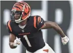  ?? MARK LOMOGLIO/AP ?? Bengals receiver Ja’marr Chase has consistent­ly dropped passes during training camp.