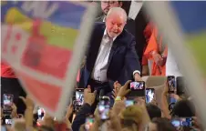  ?? — AFP photo ?? Lula greets supporters during the launch of his campaign for Brazil’s October presidenti­al election in Sao Paulo.