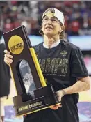  ?? Elsa / Getty Images ?? Stanford coach Tara Vanderveer, who grew up for a time in Schenectad­y, celebrates capturing her third NCAA title.