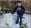  ?? SUBMITTED PHOTO ?? George Davis of Brookhaven, shown at Penn State Brandywine’s lion statue, graduated
PSU Brandywine with a bachelor’s degree in communicat­ions.