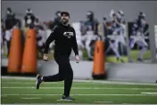  ?? DERIK HAMILTON — THE ASSOCIATED PRESS ?? Philadelph­ia Eagles head coach Nick Sirianni works during practice at the team's training facility Saturday in Philadelph­ia.
