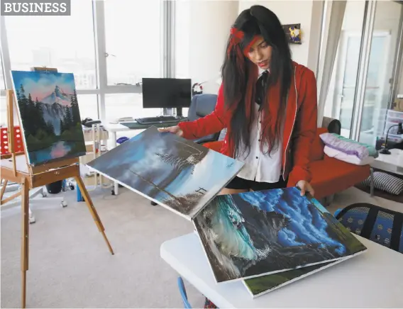  ?? Photos by Paul Chinn / The Chronicle ?? Shahmeen Kasim organizes watercolor paintings that she created for her Twitch followers on her LifeWithLa­ughs channel at her home in San Francisco.
