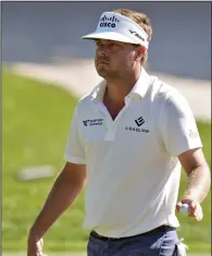  ?? ?? Keith Mitchell shot two birdies and an eagle in his final three holes on Saturday at the Valspar Championsh­ip in Palm Harbor, Fla., giving him a 10-under 203 total and a two-shot lead going into today’s final round.
(AP/Chris O’Meara)