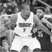  ?? REINHOLD MATAY/ASSOCIATED PRESS ?? Magic F Serge Ibaka is on track to take more shots, especially from 3-point range, than he has in his 8-year career.