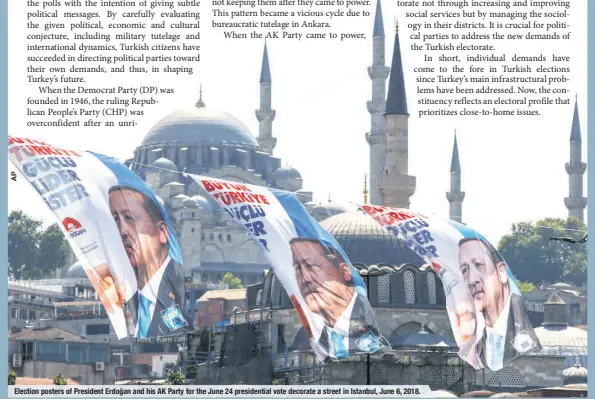  ??  ?? Election posters of President Erdoğan and his AK Party for the June 24 presidenti­al vote decorate a street in Istanbul, June 6, 2018.