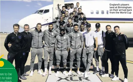  ??  ?? England’s players land at Birmingham on their arrival back from the World Cup