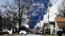  ?? ASSOCIATED PRESS ?? This enormous pillar of thick black smoke in the aftermath of the train derailment has East Palestine residents and others in the region terrified.