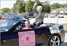  ?? SHELLEY WILLIAMS SPECIAL TO ENTERPRISE-LEADER ?? Ann Dunham, bookkeeper/treasurer for Prairie Grove School District, served as grand marshal for the 2017 Prairie Grove Homecoming Parade. She is in her 48th year working for the school district.