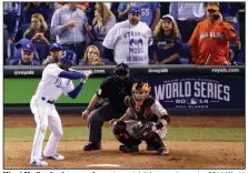  ?? (AP file photo) ?? Miami Marlins fan Laurence Leavy (rear right) is seen here at a 2014 World Series game in Kansas City, Mo. Leavy, better known as “Marlins Man,” is wondering what he’s going to do while games won’t be played because of the coronaviru­s pandemic.