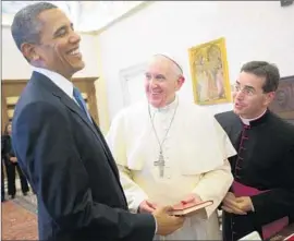  ?? Pablo Martinez Monsivais Associated Press ?? WHEN PRESIDENT OBAMA visited the Vatican in 2014, Msgr. Mark Miles, right, was there to translate for the Spanish-speaking Pope Francis.
