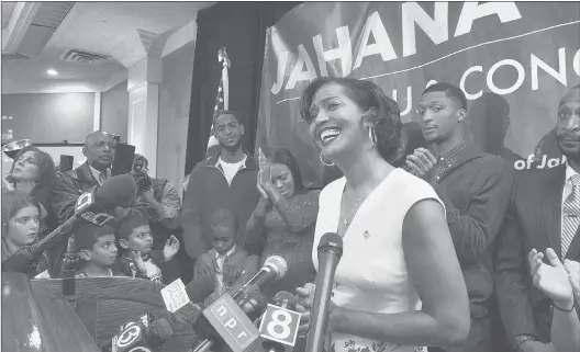  ?? PATRICK RAYCRAFT | PRAYCRAFT@COURANT.COM ?? AN EMOTIONAL Jahana Hayes declares victory at the Courtyard by Marriott hotel in Waterbury. Hayes is poised to be the first black woman to represent Connecticu­t in Congress.