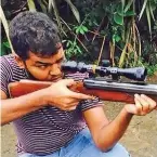  ??  ?? Auckland terrorist Ahamed Aaathill Mohamed Samsudeen poses with a firearm in a photo posted online years before the attack.