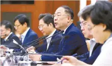  ?? Yonhap ?? Finance Minister Hong Nam-ki speaks during a economy-related ministers’ meeting at the government complex in Seoul, Wednesday.