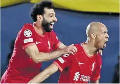  ?? EFE ?? Fabinho celebra uno de sus goles con Mohamed Salah.