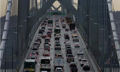  ??  ?? Vehicles cross the San Francisco-Oakland Bay Bridge in California. Photograph: Ben Margot/Associated Press