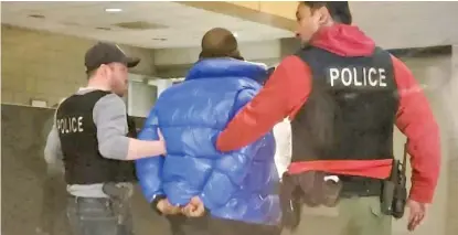  ?? NADER ISSA/SUN-TIMES ?? R. Kelly in custody at the Chicago Police Department’s Central District earlier this year.