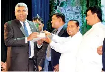  ??  ?? (Left) Insee Cement Lankaceona­ndana Ekanayaker­eceiving the Bronze award for the Chemical Industry sector for Insee Cement’s fully integrated plant in Puttalam