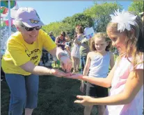  ?? OAK LAWN PARK DISTRICT PHOTO/DAILY SOUTHTOWN ?? Children learn about butterflie­s Saturday at the Oak Lawn Park District’s third annual Monarch Festival at the Oak View Center.
