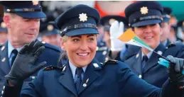  ?? Photos: Niall Carson, Yui Mok, Valerie O’Sullivan ?? Members of An Garda Síochána during the St Patricks Day Parade in New York; right, Kate Middleton quaffs a pint of Guinness after the the 1st battalion Irish Guards held their parade in Hounslow; below, Maud Hickey enjoys a patriotic ice cream in the...