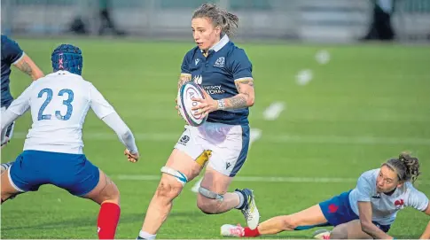  ??  ?? Jade Konkel breaks during Scotland’s 13-13 draw with France yesterday at Scotstoun, a result that sees England crowned 2020 Women’s Six Nations champions. Rachel Shankland scored Scotland’s try in the 73rd minute.