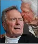  ?? AP PHOTO/CHARLES KRUPA ?? In this June 12, 2012 file photo, former President George H.W. Bush, and his wife, former first lady Barbara Bush, arrive for the premiere of an HBO documentar­y on his life near the family compound in Kennebunkp­ort, Maine.