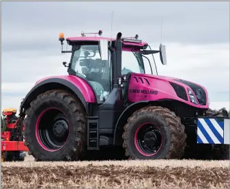  ?? Ref:RH28092212­6 ?? NEW HOLLAND tractor brand in Cancer Research colours