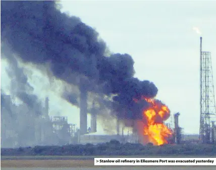  ??  ?? &gt; Stanlow oil refinery in Ellesmere Port was evacuated yesterday