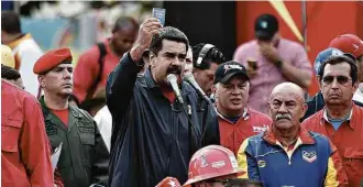  ?? Carlos Becerra/AFP ?? Maduro anuncia Assembleia Constituin­te ‘popular’ em comício do 1º de Maio em Caracas