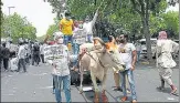  ?? VIPIN KUMAR/HT PHOTO ?? Congress workers at a protest against fuel price rise at Shastri ■
Bhawan in New Delhi on Monday.