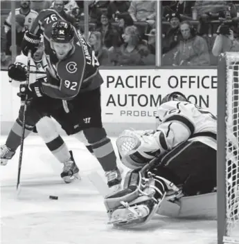  ?? John Leyba, The Denver Post ?? Los Angeles Kings goaltender Jonathan Quick goes low to make a save on a shot by Avalanche left wing Gabe Landeskog during the first period Thursday night at the Pepsi Center. Colorado scored the first goal of the game but then gave up seven in...