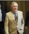  ?? CAROLYN KASTER — THE ASSOCIATED PRESS ?? Senate Majority Leader Mitch McConnell of Ky. walks from his office on Capitol Hill in Washington, Monday.