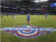  ?? RICHARD LAUTENS/TORONTO STAR ?? A sold-out crowd welcomed their Jays back to the Rogers Centre Monday.