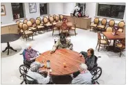  ?? AMR ALFIKY / THE NEW YORK TIMES ?? Residents of the Good Shepherd Nursing Home play bunco in Wheeling, W.Va., on Feb. 8. West Virginia is among states that have reported finishing vaccinatio­ns at all nursing homes.