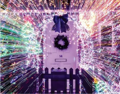  ?? Picture: EMPICS ?? SHINE A LIGHT: Households will count the cost of flashy festive illuminati­ons in their new year bills