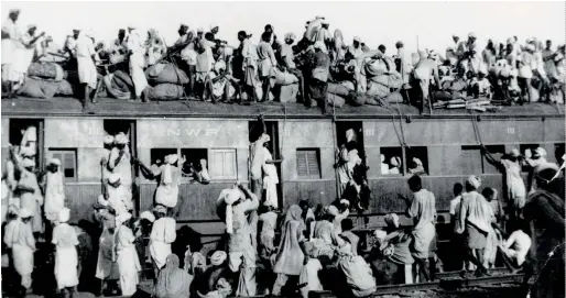  ?? AP ?? Hundreds of Muslims crowd on top a train leaving New Delhi for Pakistan in September 1947 after Britain ended its colonial rule over the Indian subcontine­nt and two independen­t nations were created in its place — the Hindu-majority nation of India, and the Muslim majority Pakistan. —