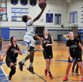  ?? / Frank Crowe ?? Gordon Central’s Mercedes Coleman sails through the air for a layup against Chattooga in a home contest earlier in the season.