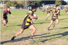  ??  ?? Foxton winger Illi Soni Rauhihi slips through the Waikanae defence.