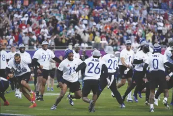  ?? JOHN RAOUX/AP ?? NFC PLAYERS celebrate winning the flag football event at the Pro Bowl game on Sunday in Orlando.