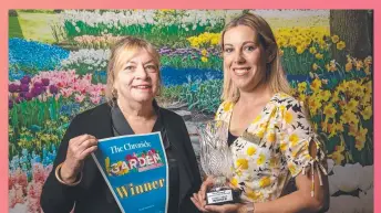  ??  ?? Collette Smith (left) and Amy McGaw on behalf of Toowoomba East State School, cnr Arthur and Mary streets, Toowoomba, the Student Garden winner.